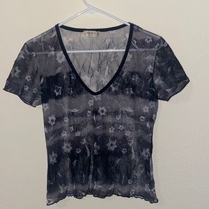 Black sheer top with white flowers